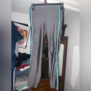 Under Armour Women’s Leggings in Gray with Teal Stripes